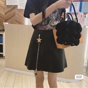 100% real leather skirt with star accents